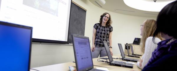 A librarian teaching a class in the library's e-classroom